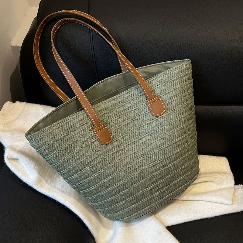 草編包包女大容量新款度假沙灘草包編織菜籃通勤托特水桶包