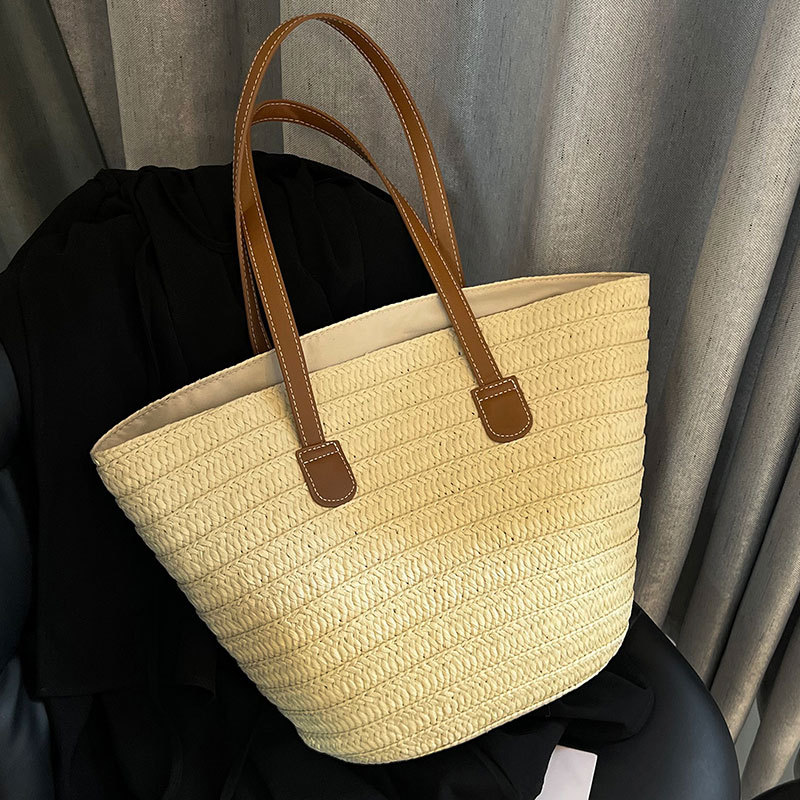 草編包包女大容量新款度假沙灘草包編織菜籃通勤托特水桶包