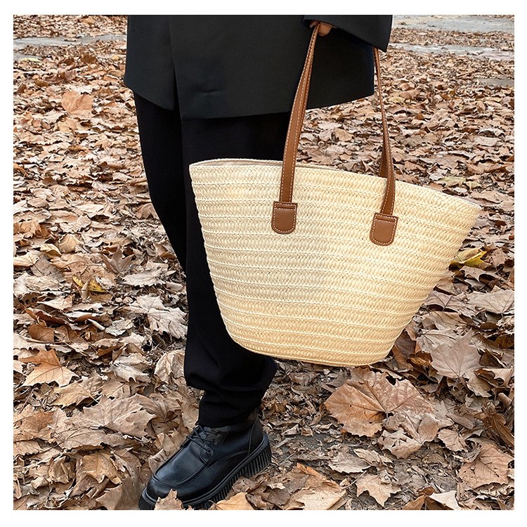 草編包包女大容量新款度假沙灘草包編織菜籃通勤托特水桶包